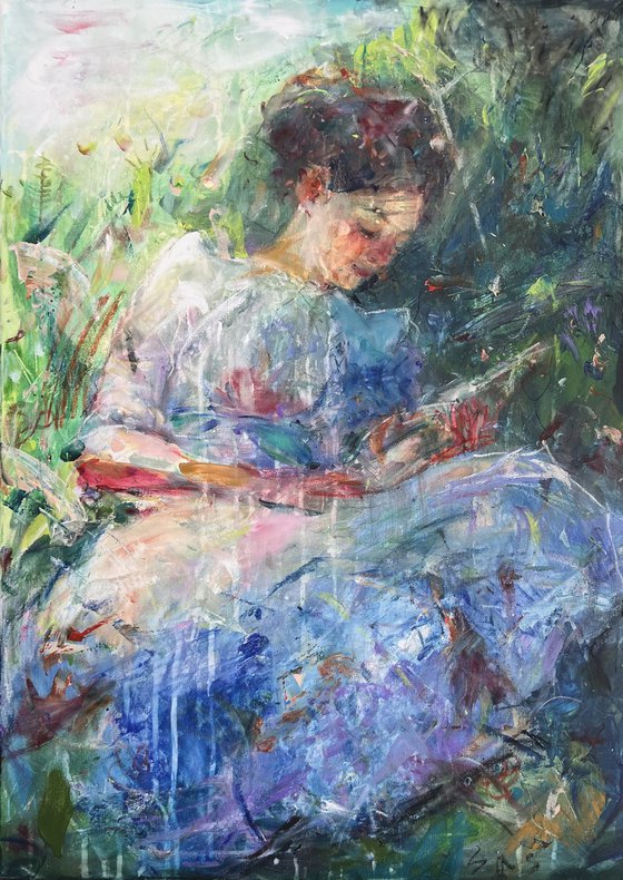 Reading girl under a tree