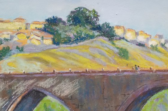 Sunlit Toledo's Town Bridge