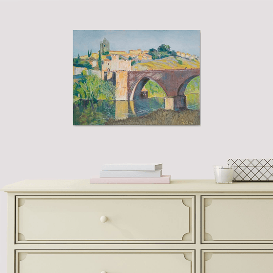 Sunlit Toledo's Town Bridge