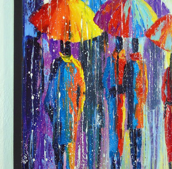 Lovers notice not rain, but multi-colored umbrellas