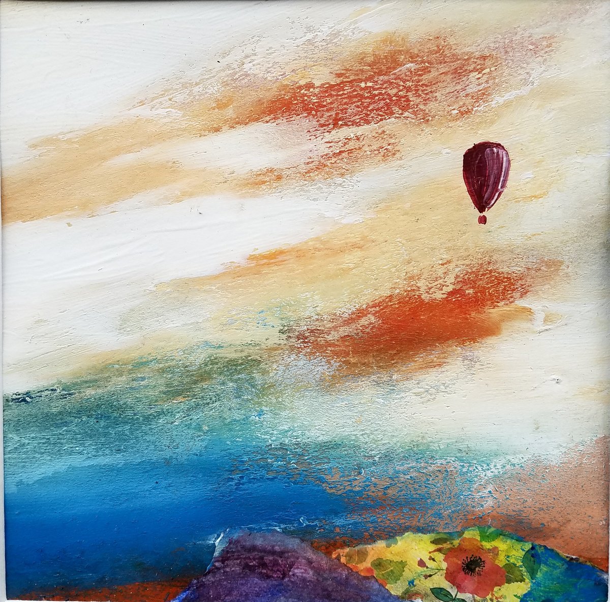 Balloon Against Orange Sky by Kevin Blake