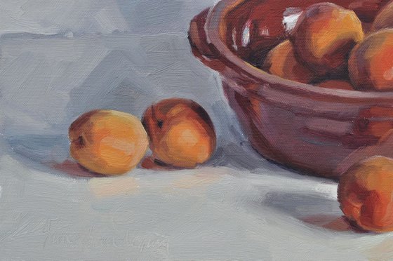 Apricots in an earthenware dish