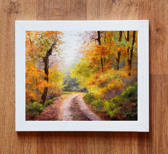 Autumn road in the forest