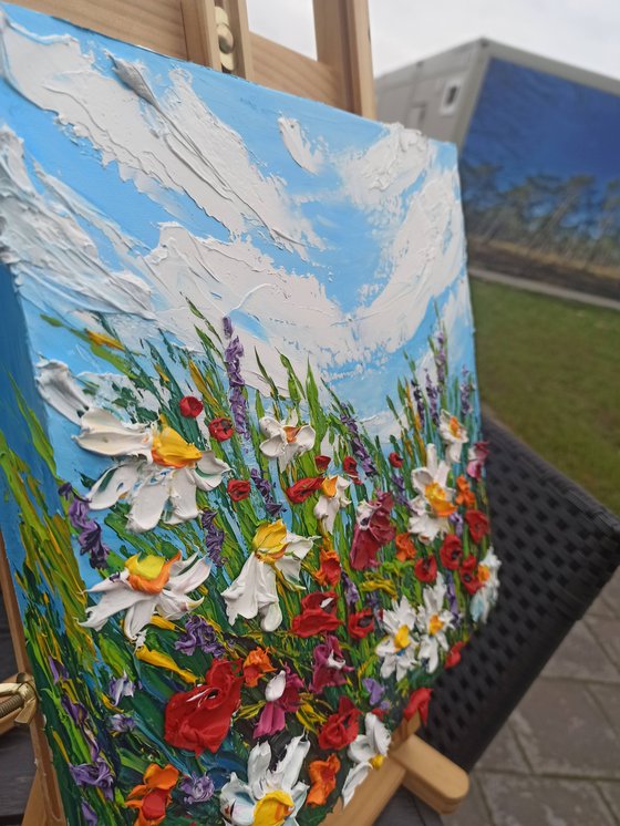 Impasto daisies and poppies at the meadow