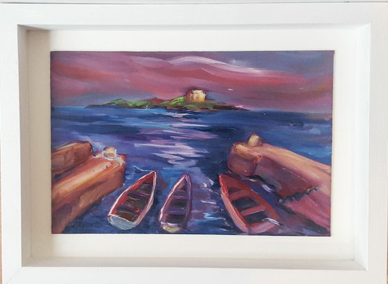 Evening over Dalkey Island with the boats of Coliemore Harbour