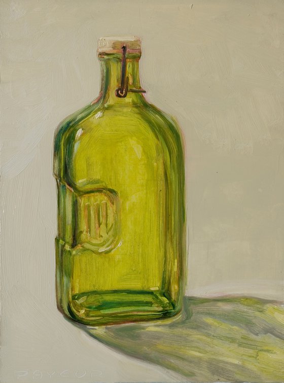 green bottle on a light background