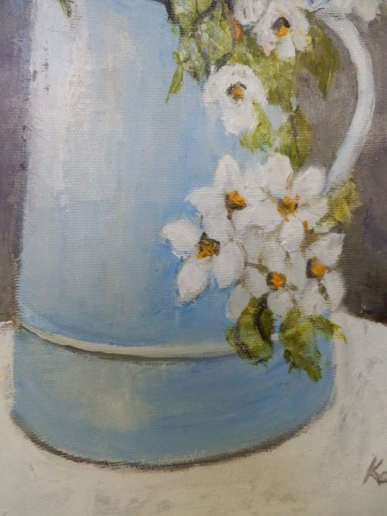 Spring flowers in a cup