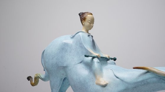 A Boy Riding A Dragon Horse