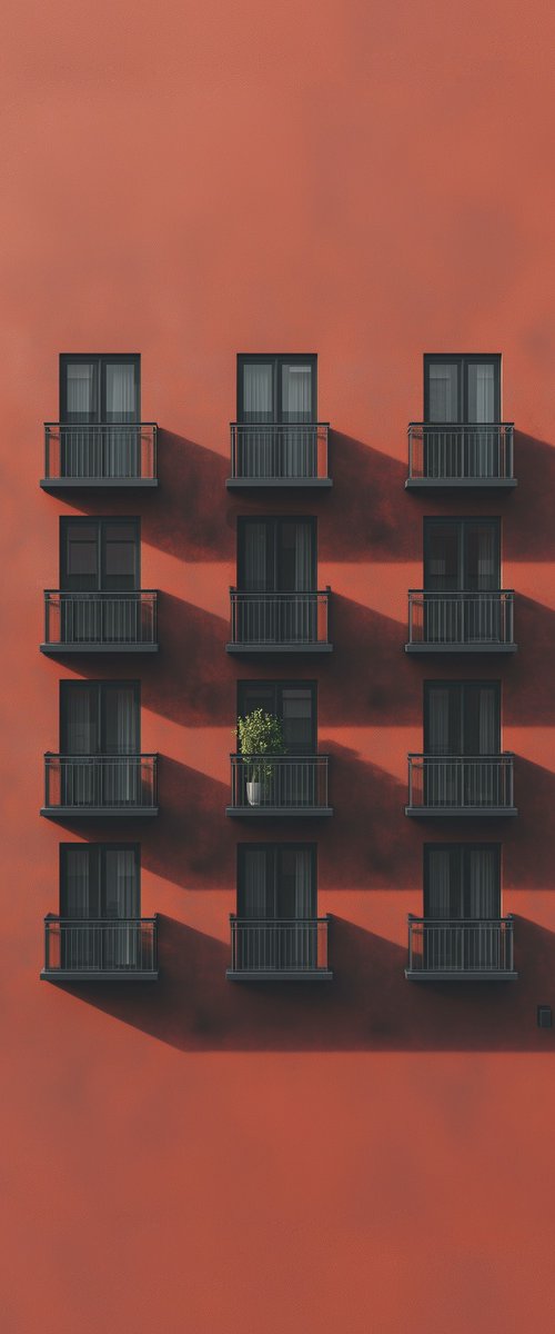 Red wall with a single tree by Marcus Cederberg