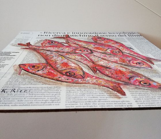 "Red Fishes on Newspaper"