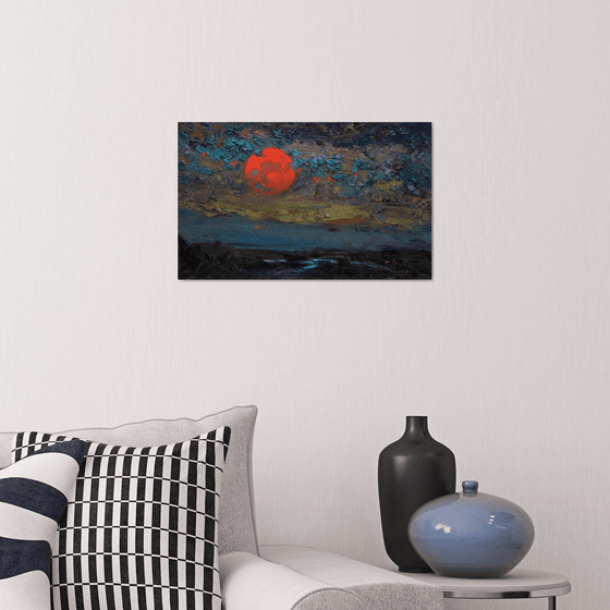 Red moon and clouds