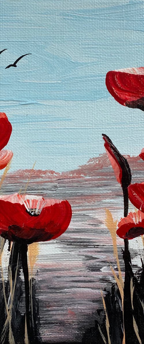 Abstract poppies against a blue sky by Marja Brown