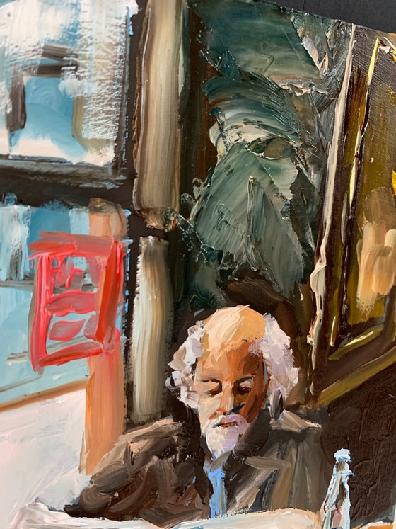 Old man in a cafe.