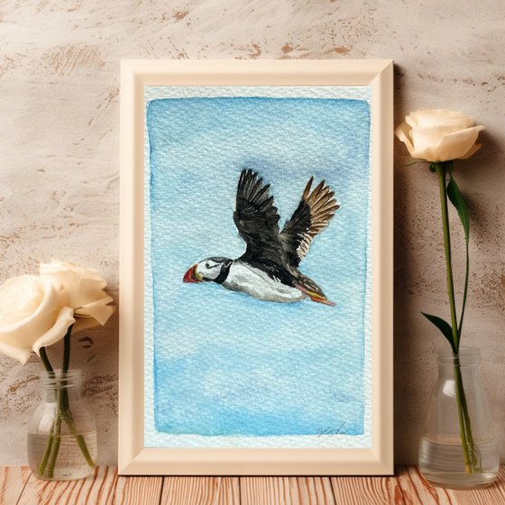 Three little puffins