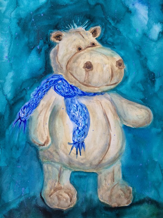 Toy hippo in blue scarf