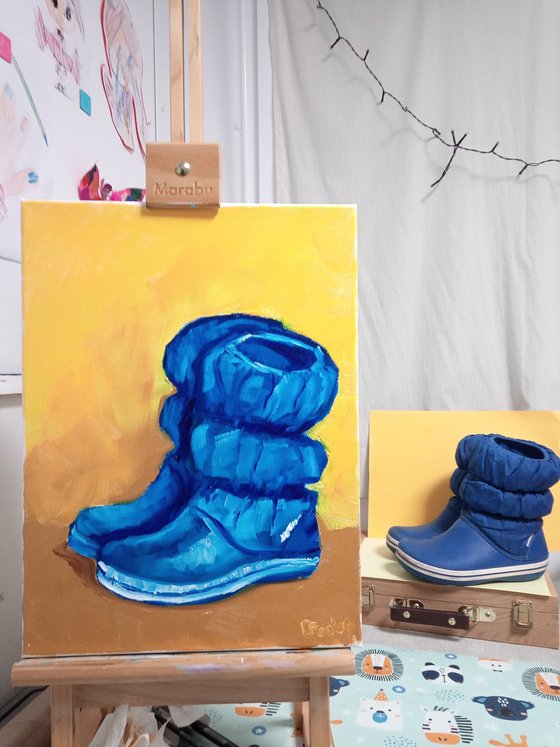 Still life with the blue rubber boots