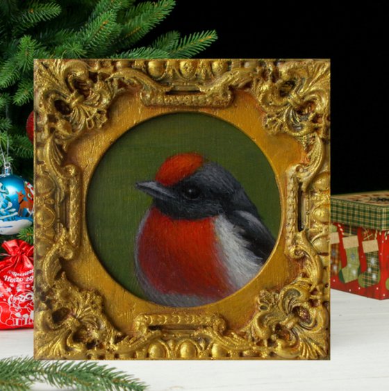 Small bird painting in frame