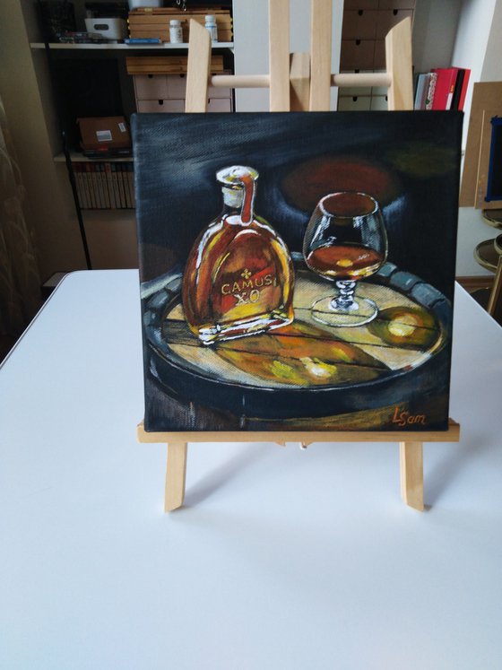 A man's still life with cognac