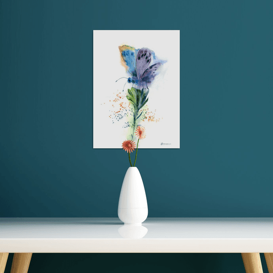 Butterfly on the green flower