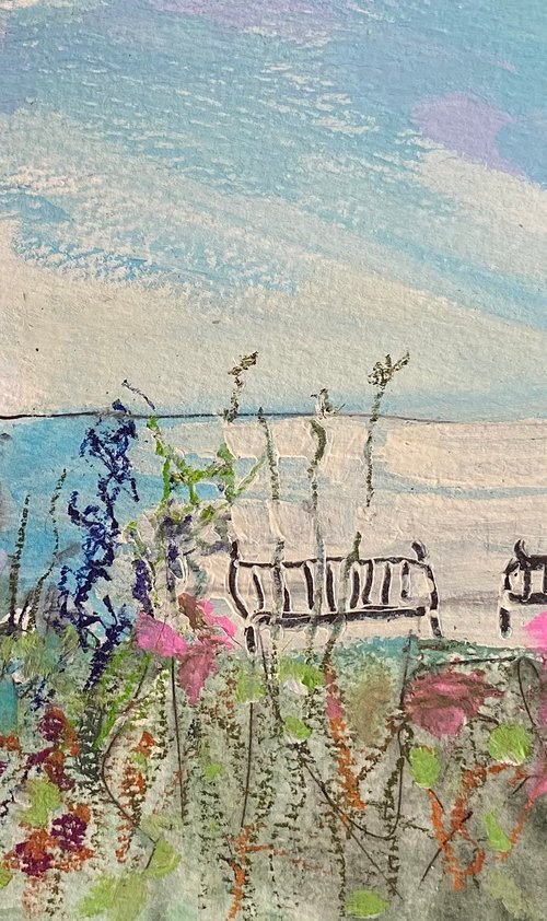 Beach Huts And Benches by Nikki Wheeler