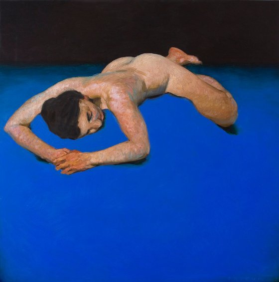 modern nude woman on deep blue background