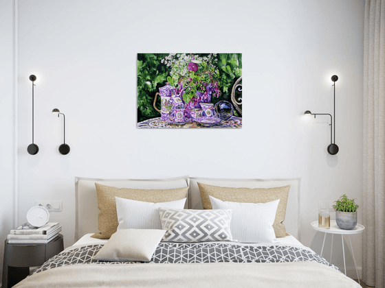 Still life with tea set in the garden