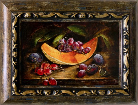 Grapes ,plums with a melon