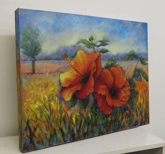 Red Hibiscus in a Landscape