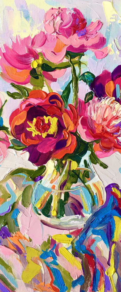 Bright peonies in a glass vase by Ole Karako