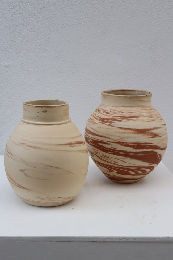 Two mixed clay moon jars