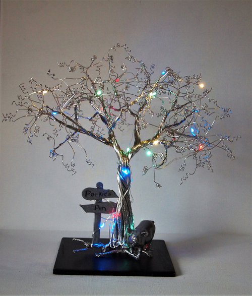 Tree with pig, signpost and lights by Steph Morgan