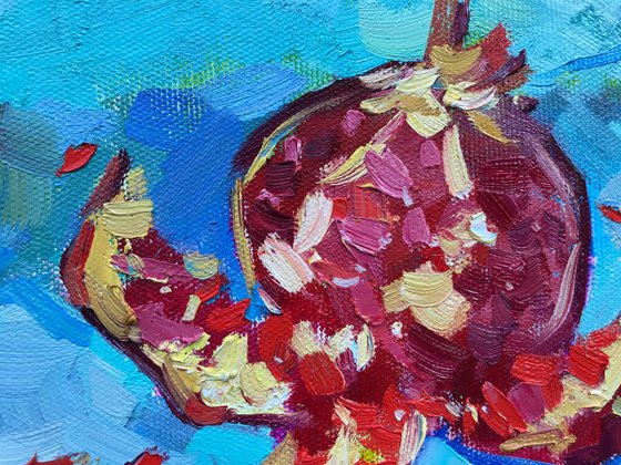 pomegranate on blue