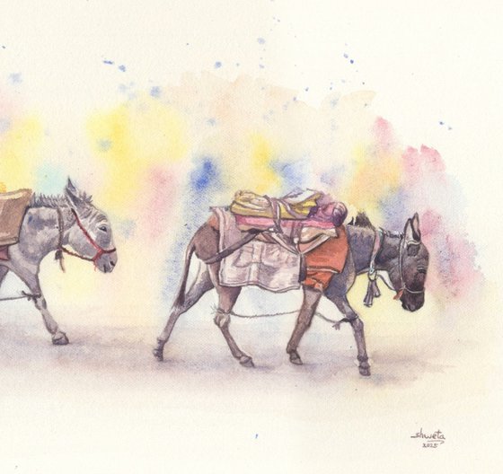 Three donkeys on the road