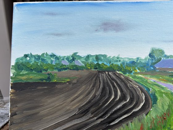 Plowed field, road and windmill . Plein Air