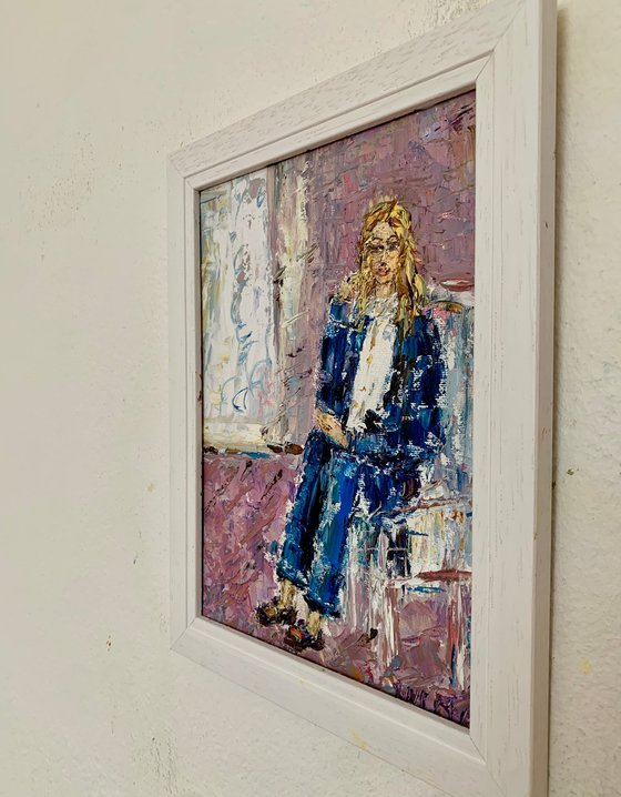 Portrait of a seated young woman