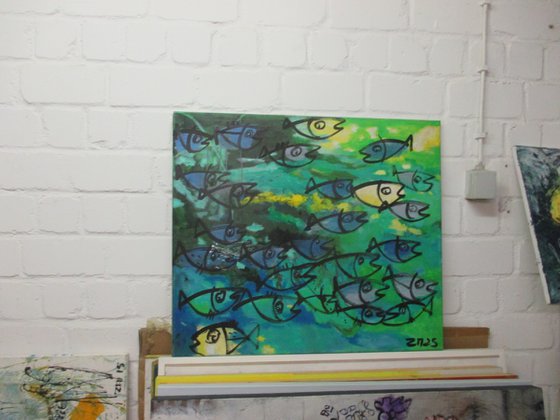 blue fishes jumping