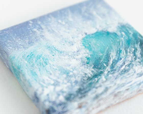 Miniature blue ocean waves