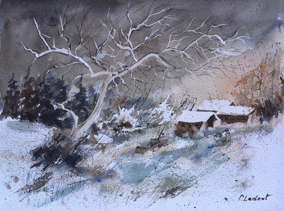 A few houses in the snow