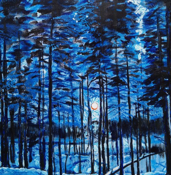 Full moon in the winter forest