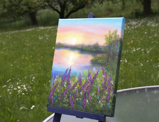 Lake with lupines meadow