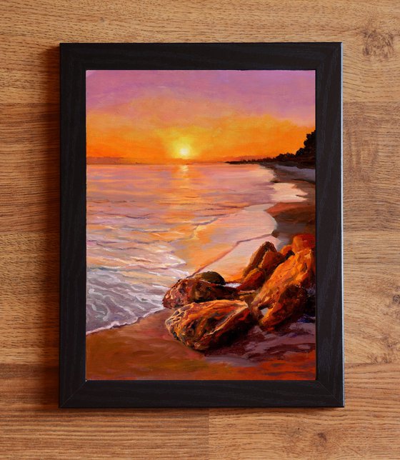 Sunset beach seascape with rocks