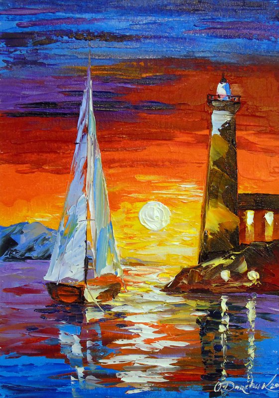 Sailboat and lighthouse