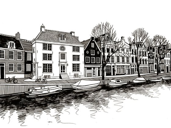 Boats on a canal of Amsterdam.