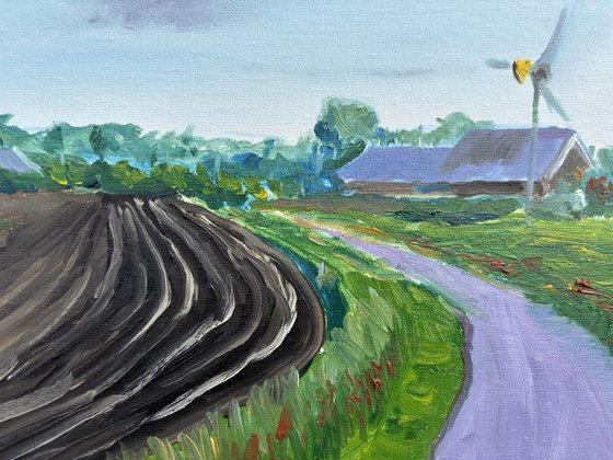 Plowed field, road and windmill . Plein Air