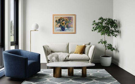 Sunflowers in a blue vase