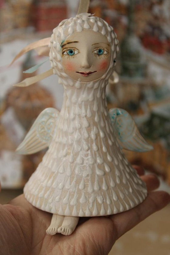 Angel. Bell-Doll, little ceramic sculpture.