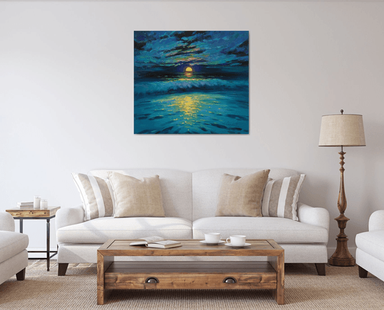 Moonrise in blue over sea