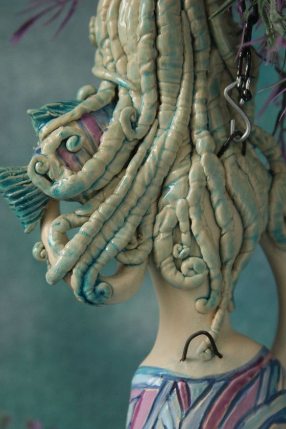 Mermaid with a fish,  Wall sculpture by Elya Yalonetski.