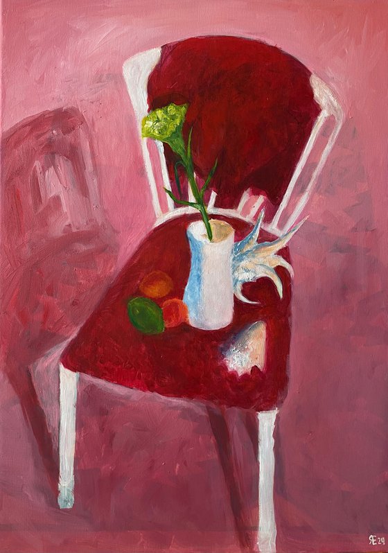 Still life with a red chair