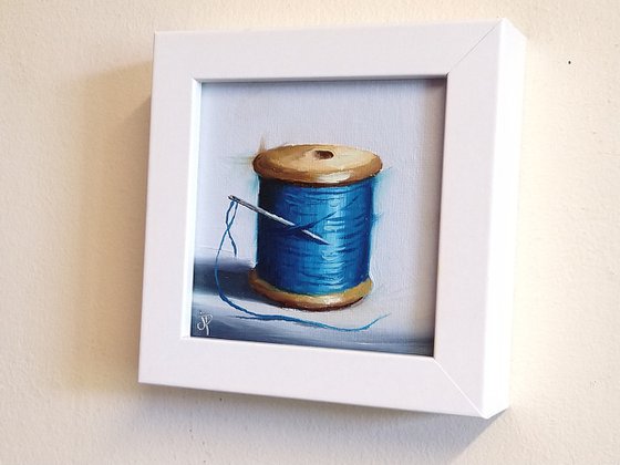 Little blue  cotton reel still life